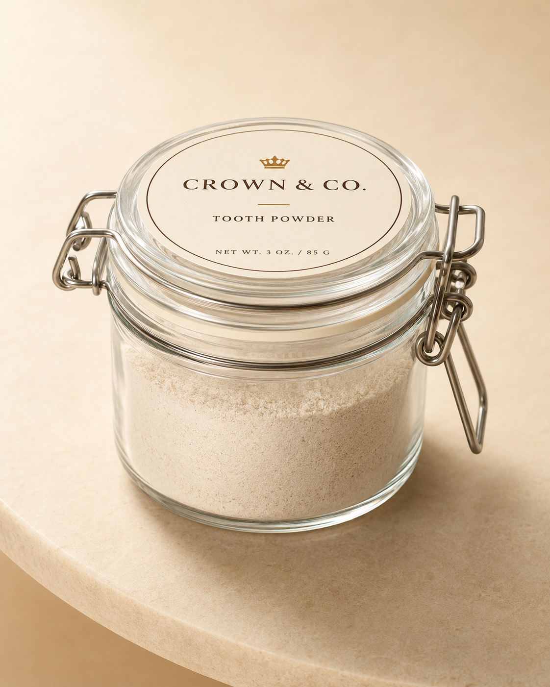 Crown Powder — premium tooth powder in a frosted glass jar with brass lid